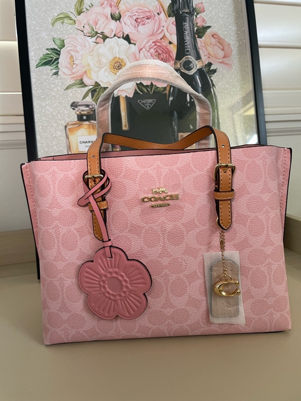 pink tote with flower charm